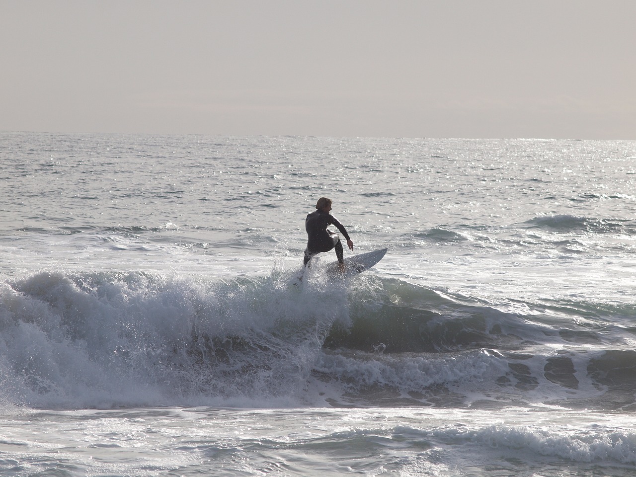 Surfing in Trigg Beach